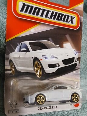Matchbox 2004 Mazda RX-8 Toy Car in White with Gold Wheels
